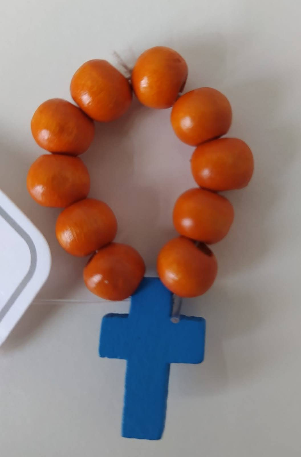 Dizainier orange croix bleue