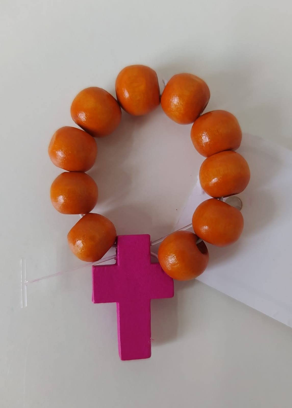 Dizainier orange croix rose foncée