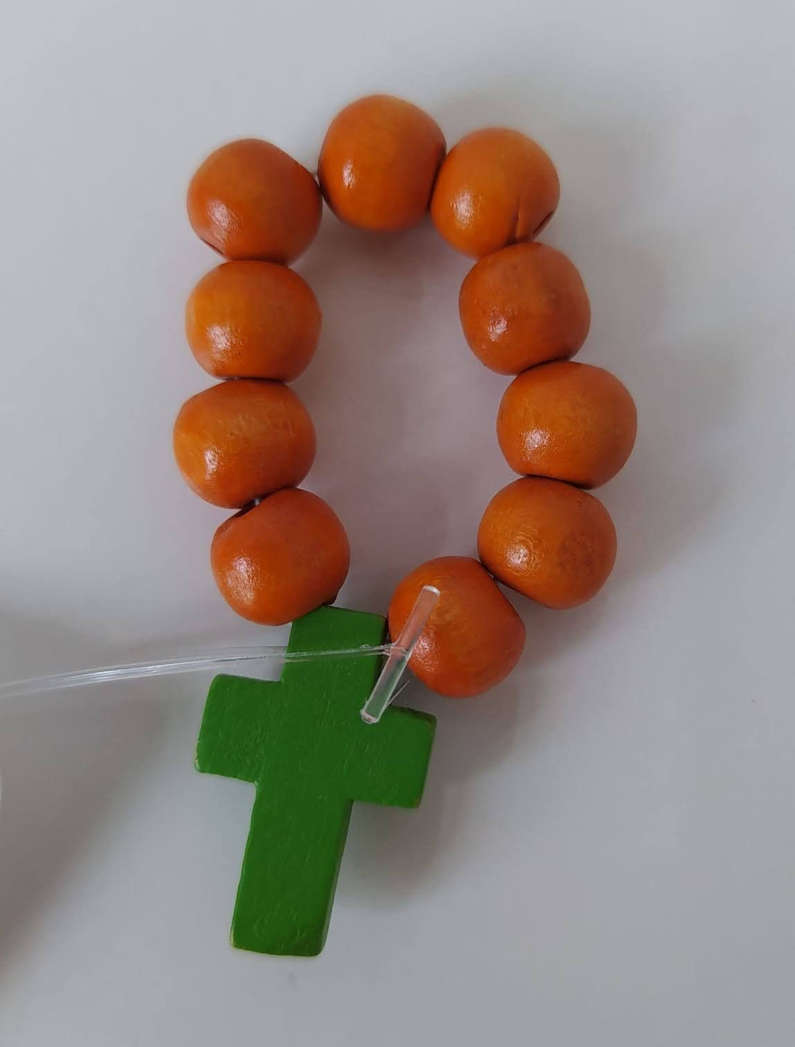 Dizainier orange croix verte