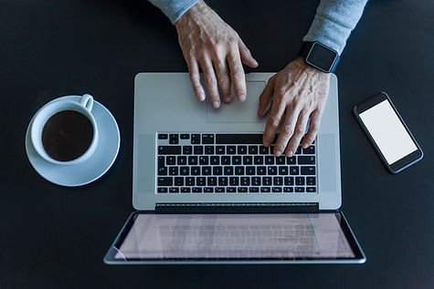 Hands Using Laptop