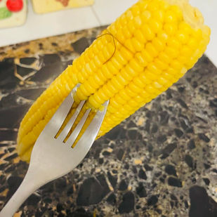 Boil corn