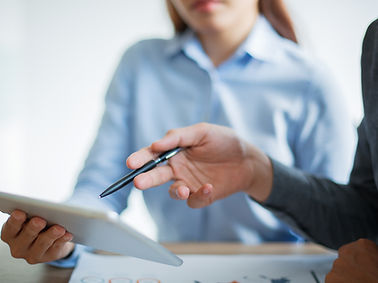 business-team-discussing-information-touchpad.jpg