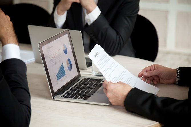 negotiations-contract-meeting-three-partners-close-up.jpg