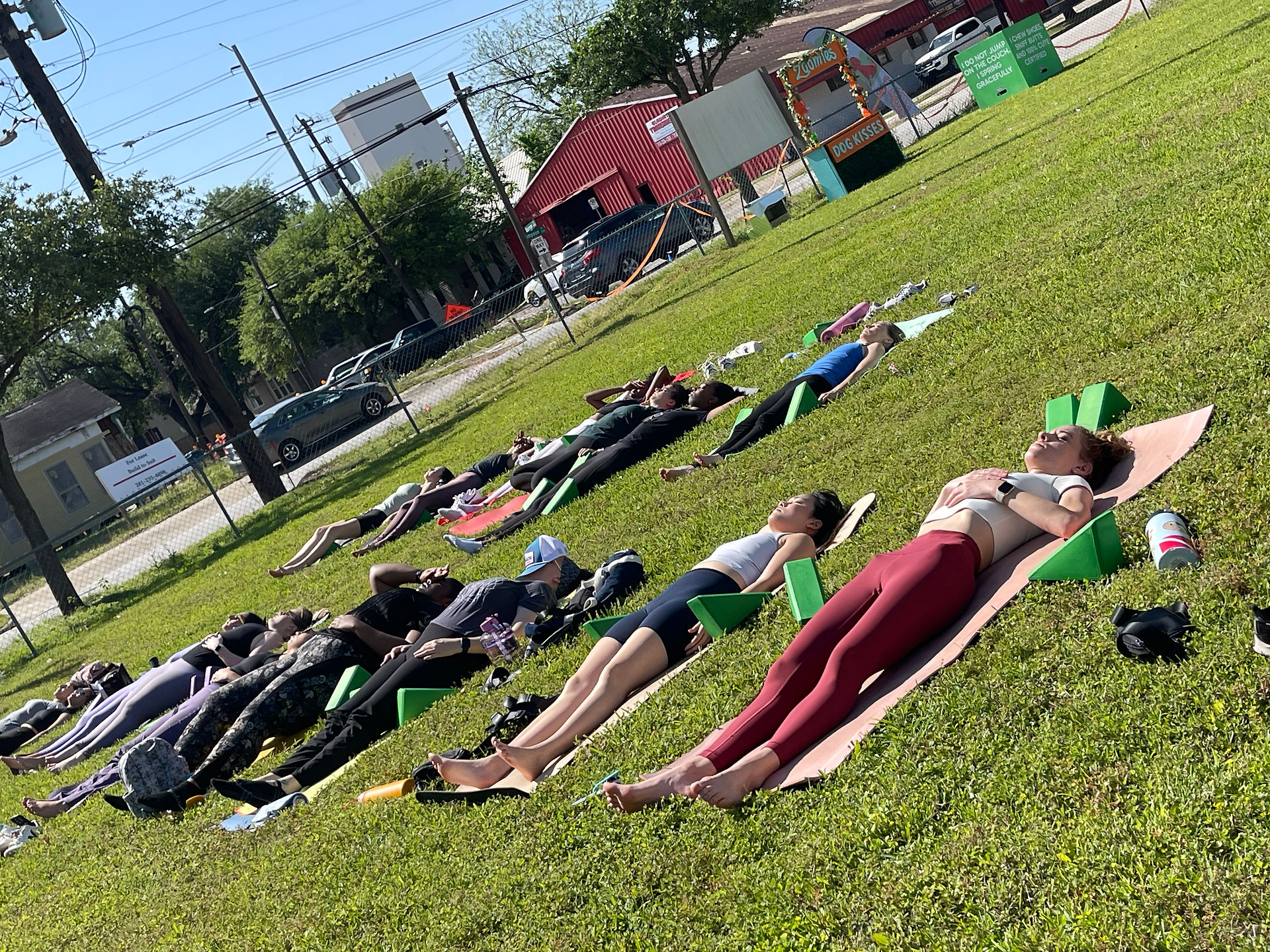 A group of yogis relaxing in shavasana.