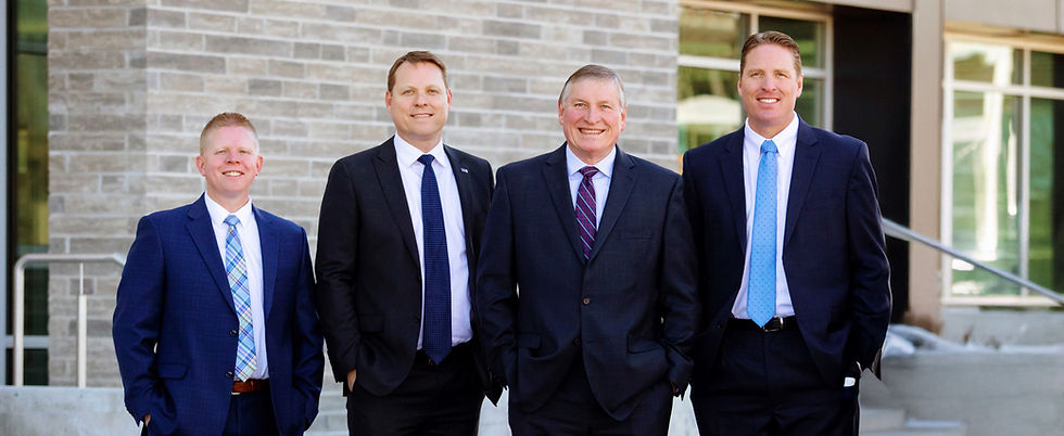 Executive leadership of D.L. Evans Bank in 2025 standing in a group photo.