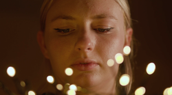 Niamh Heaton as the Student