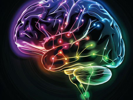 A vibrant, artistic rendering of a human brain on a dark background, showing glowing, colorful neural networks and connected pathways in shades of purple, red, and blue, symbolizing brain activity and the healing process of EMDR therapy