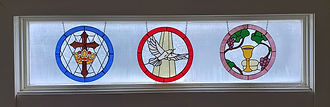 2022-09 stained glass over the front doors.jpg