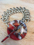 Endless Repetition
from the Art of the Circle series
7.5 x .50 x .25"
jewelry bracelet
silver, resin toggle
$775.