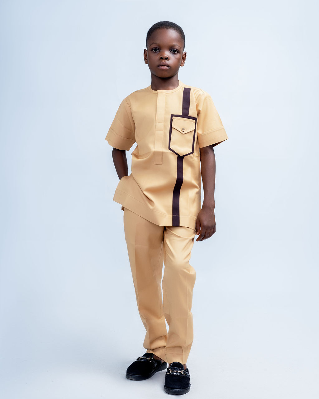 beige colored boys Dashiki shirt and pants set, front view