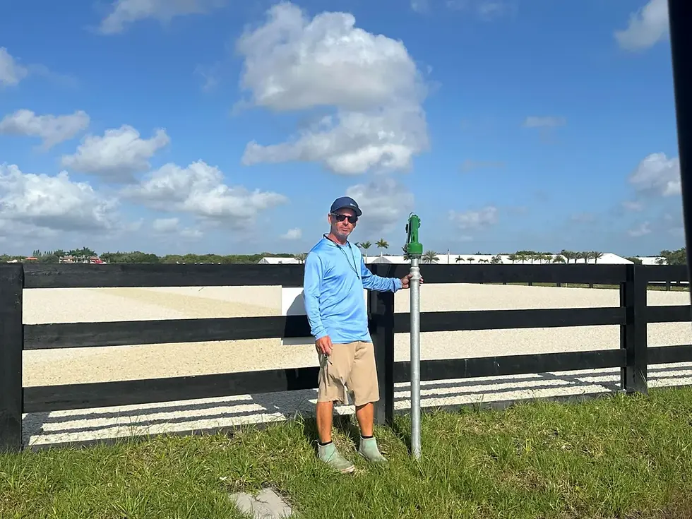 Jason Martinez of Loxahatchee Irrigation with one of the super soaker irrigation guns.