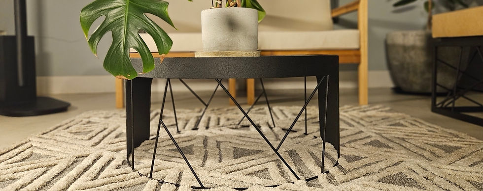 Side view of CRUX minimalist steel coffee table