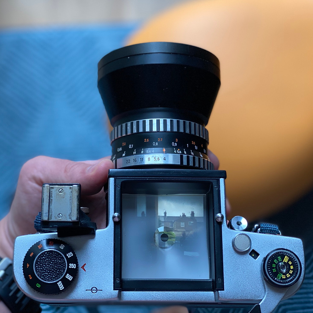 Kiev 60 SLR showing focusing screen without hood or pentaprism mounted.