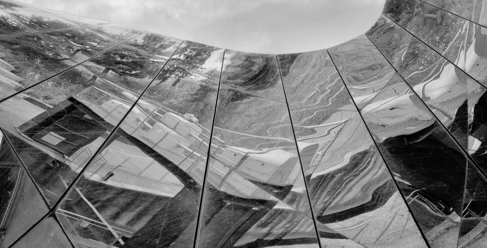 An abstract black and white shot upside down of a bridge in the Stratford Olympic Park