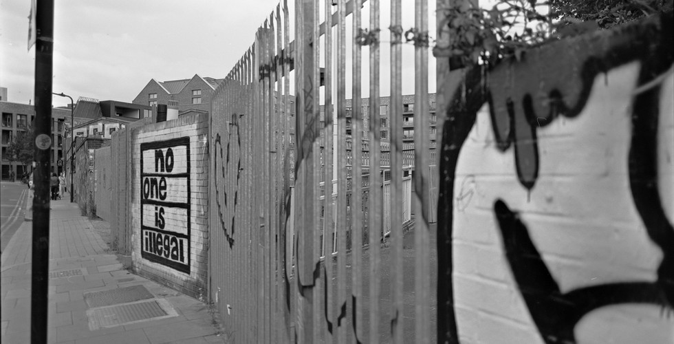 Black and white street shot at the back of Hackney Wick station (old disused entrance)