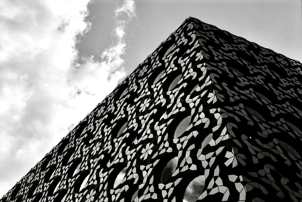 Geometric black and white photograph of detail from Ravensbourne University building at North Greenwich