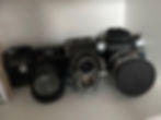 A photograph of 3 medium format film cameras.