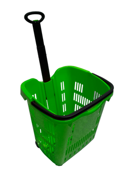 A green plastic shopping cart with wheels and a black extendable handle, designed for transporting goods in a retail or grocery store environment.