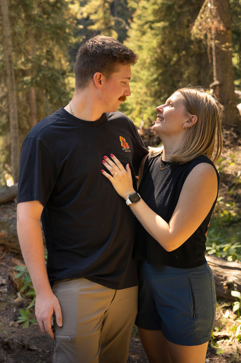 Just engaged couple at Ousel Falls in Big Sky Montana