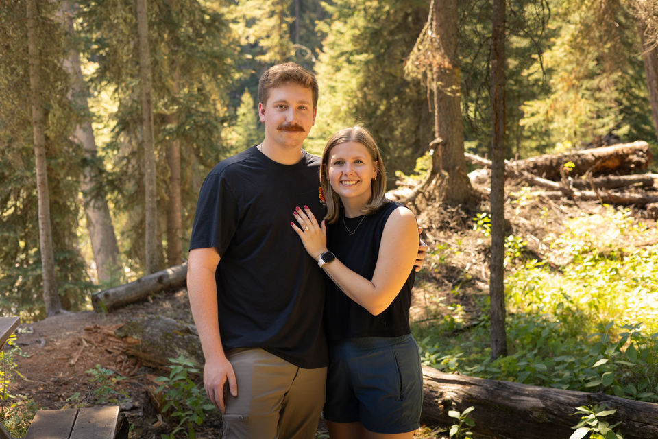 Just engaged couple at Ousel Falls in Big Sky Montana