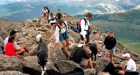 crowded-mountain-summit-colorado_h.jpg.webp
