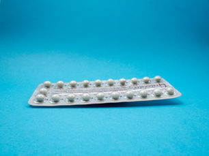 birth control on blue background