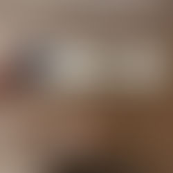 girl holding white and blue pregnancy test that says pregnant