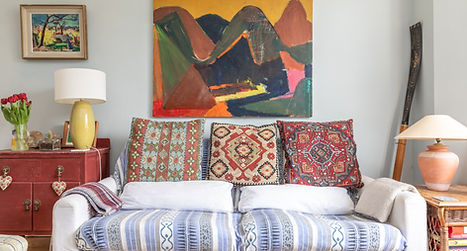 Colourful, modern and artful sitting room.