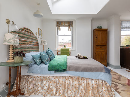 attic room headboard and blind