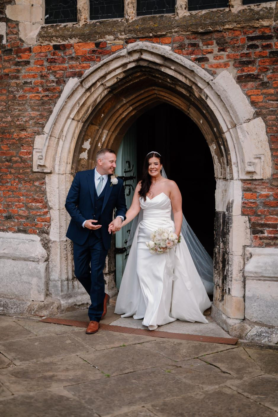 Elizabeth Kate bride Wearing Eva Lendel Fitted Plain Wedding Dress With Overskirt