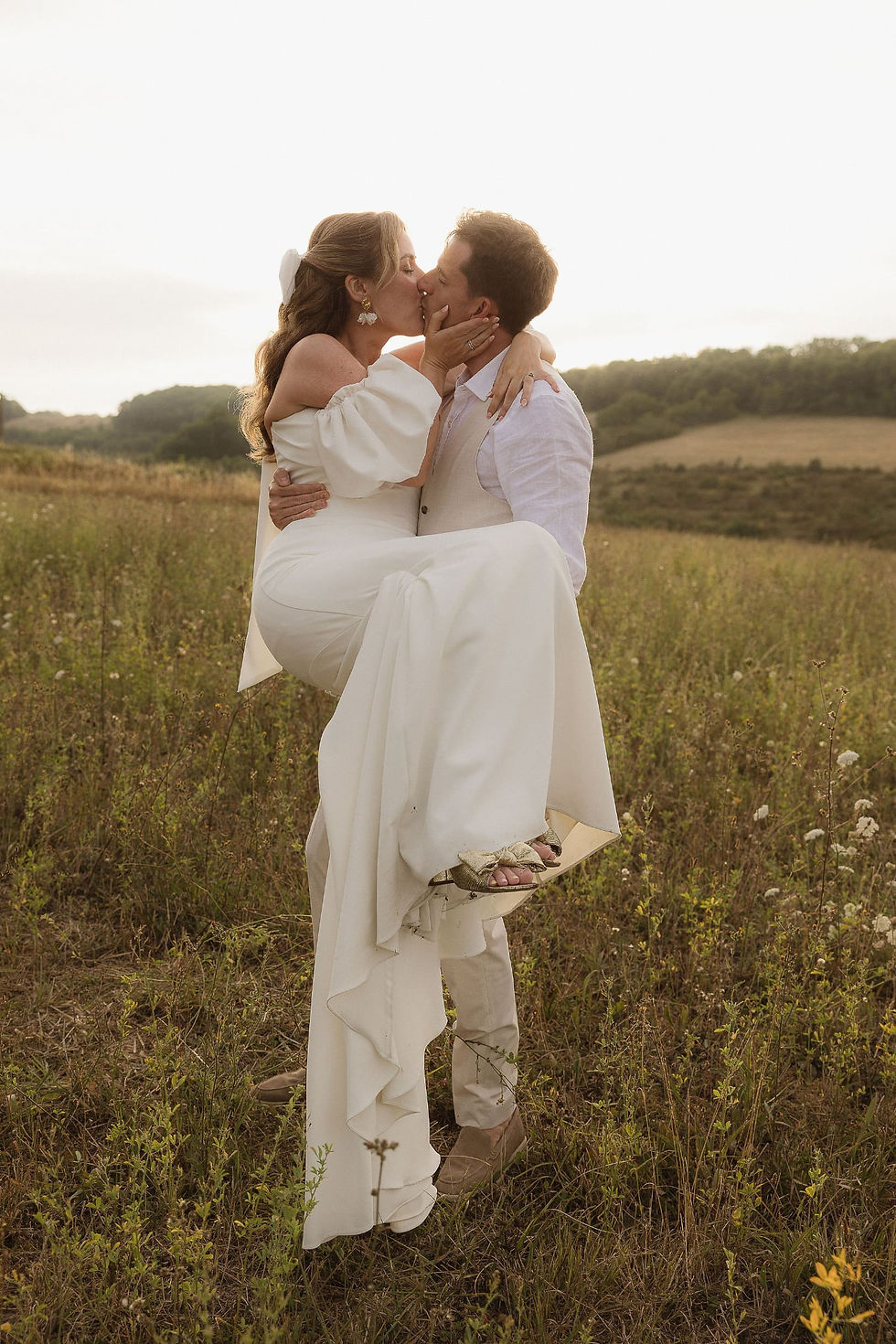 Real bride Chloe wearing the Levi dress by Serene by Madi Lane at her romantic French farmhouse wedding in France.