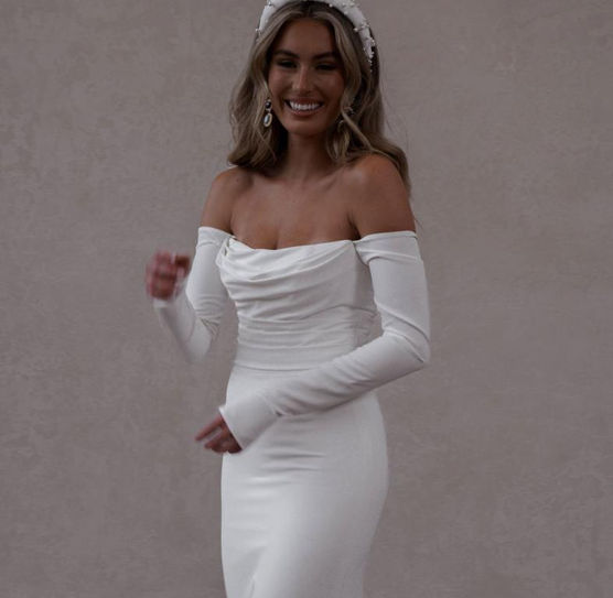 Bride wearing MWL Winter Long Sleeve Wedding Dress at Elizabeth Kate Crowle