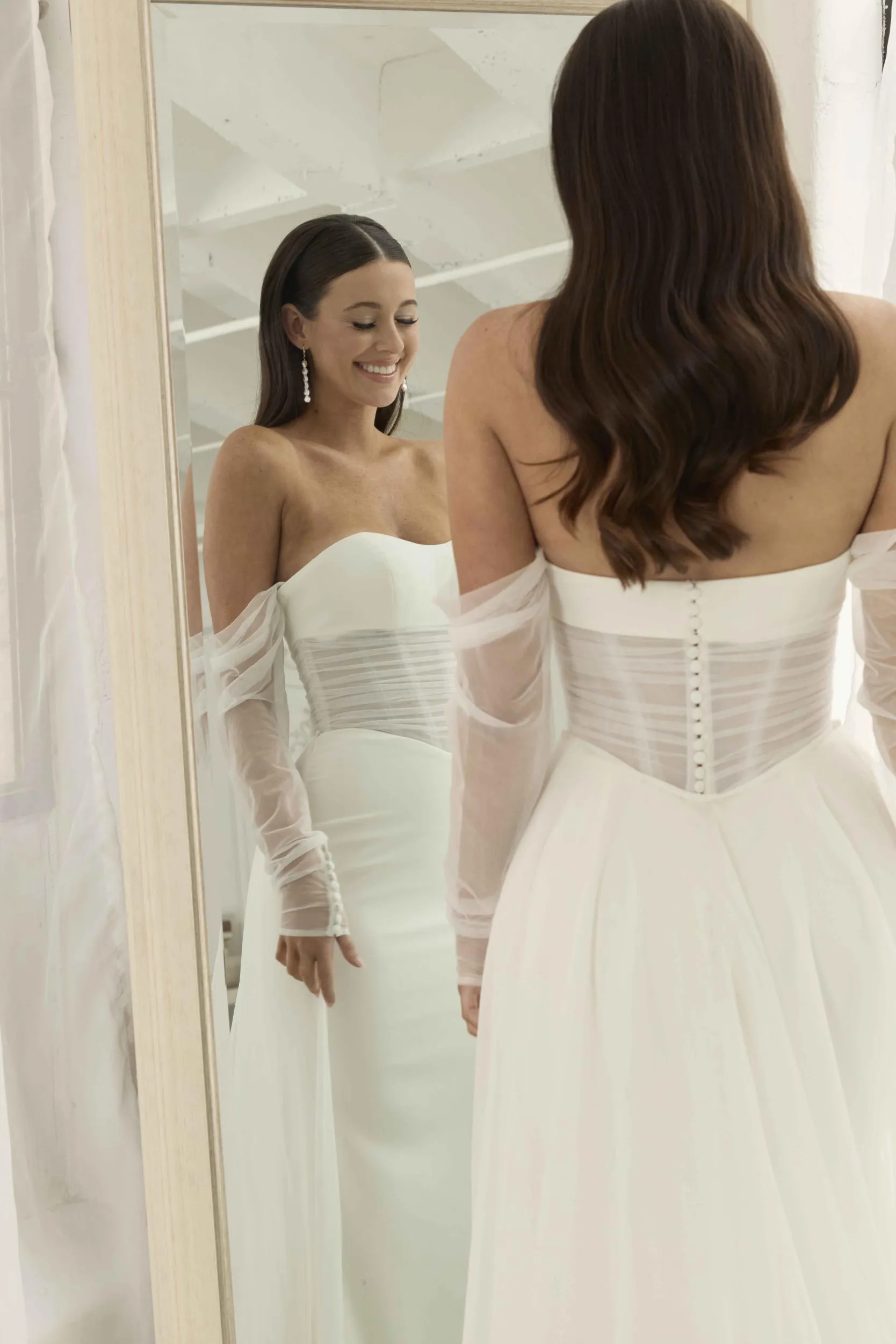 Serene Roman wedding dress with detachable sleeves and skirt at Elizabeth Kate Bridal Crowle Lincolnshire