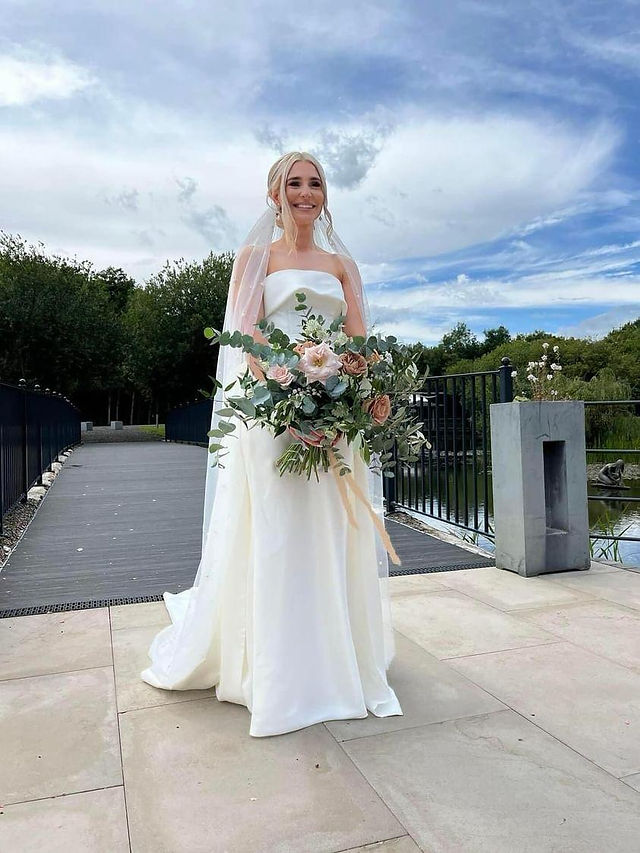 Real Elizabeth Kate bride wearing Eva Lendel Alegra wedding dress and overskirt 