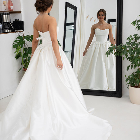 Bride trying wedding dresses Inside Elizabeth Kate Bridal Wedding Dress Shop in Crowle North Lincolnshire
