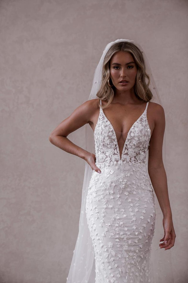 Bride wearing fitted lace Made With Love Elliot wedding dress from Elizabeth Kate Crowle Scunthorpe