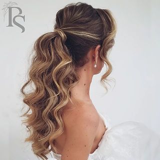 Bride with hair in hollywood waves ponytail 