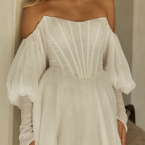 Modern lace wedding dress with 3D floral detail at Elizabeth Kate Bridal boutique in Crowle, Lincolnshire - Serene by Madi Lane designer gown for 2027 brides