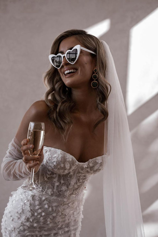 Bride wearing Made With Love fitted strapless wedding dress with textured 3D lace from Elizabeth Kate Crowle Doncaster