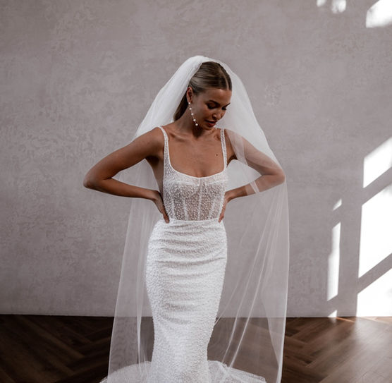 Bride wearing made with Love Freddie Pearl Square neck Wedding dress from Elizabeth Kate Crowle Doncaster