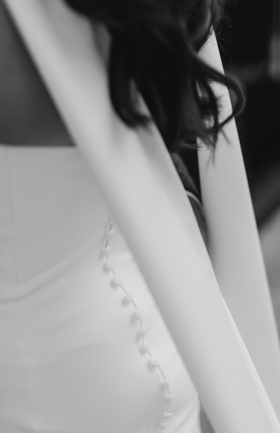Close-up of Elizabeth Kate Bridal bride's elegant wedding dress showing the feminine bridal details
