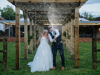 Real bride Rachel wearing her A-line wedding dress from Elizabeth Kate Bridal at her wildflower F1 wedding near Scunthorpe, Lincolnshire
