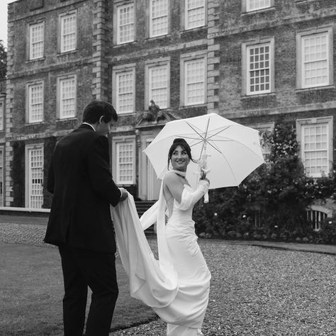 Lizzy and Finn’s elegant Lincolnshire wedding at Gunby Hall, with a personalised wedding dress featuring custom sleeves, and long scarf