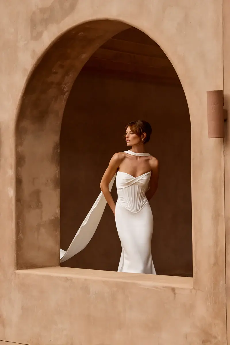 Bride wearing Made With Love Sol fitted satin wedding dress from Elizabeth Kate Bridal.