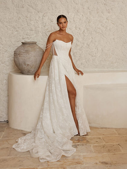 Full front view of the Serene Vaughn wedding dress in Chantilly lace with pearl beading, scoop neckline, off-shoulder straps, and slim A-line silhouette.