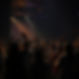 Young People in a dark room worshiping God in service .jpg