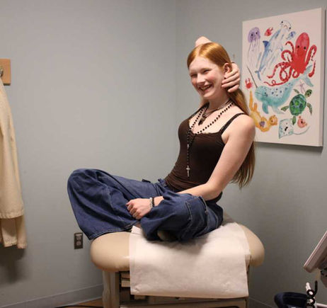 Redhead female teen preparing for gender affirming surgery