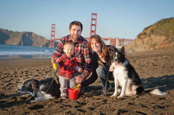 Young Family with a dog at Baker Beach San Francisco