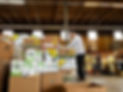 Woman arranging food bank boxes