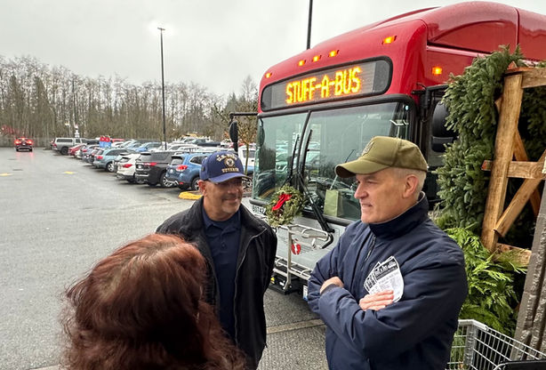 Rick Larsen visits us at our annual Stuff a Bus event in Everett
